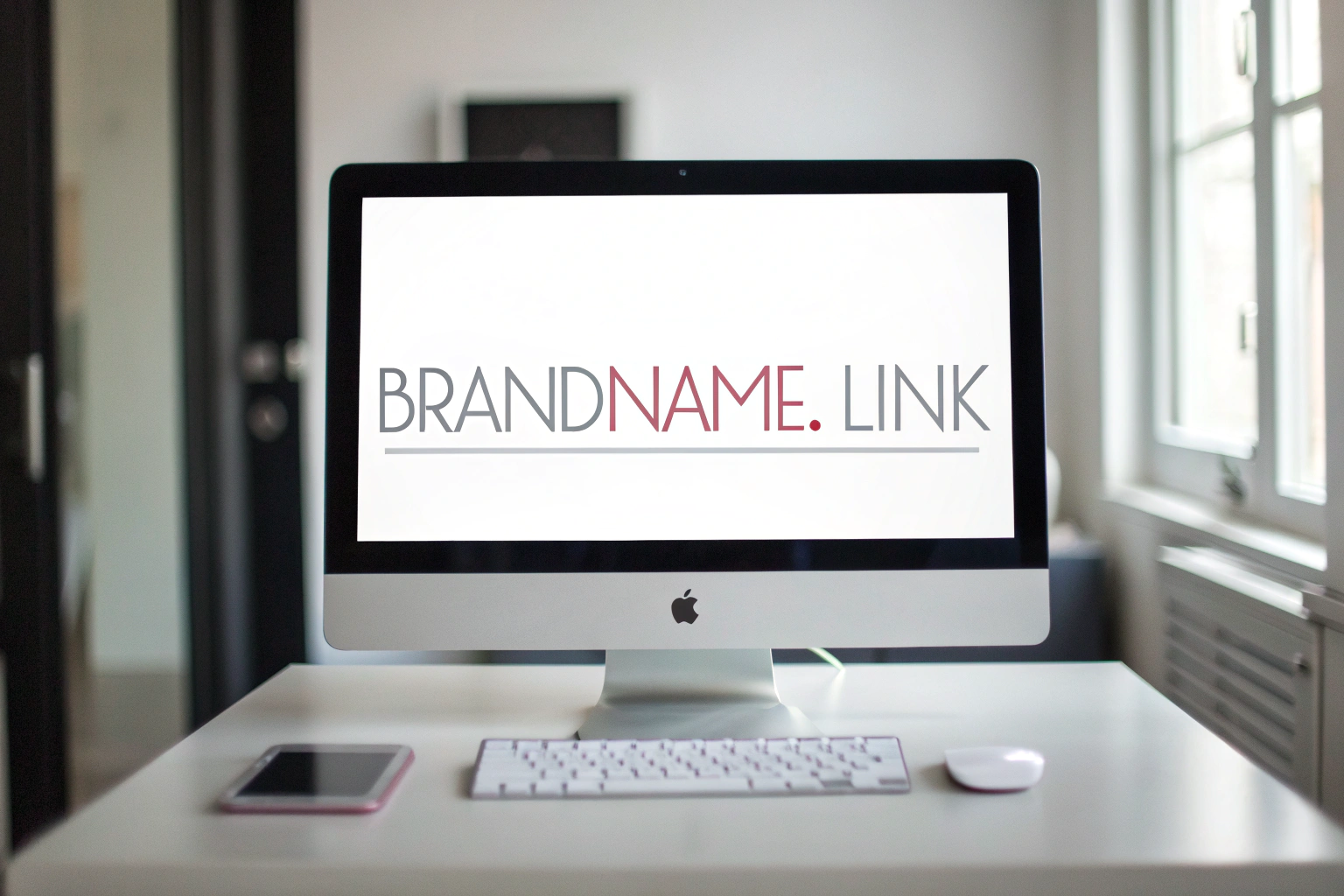 A modern computer screen on a minimalistic office desk showing a branded URL link 'brandname.link' in a soft-glow lighting environment.