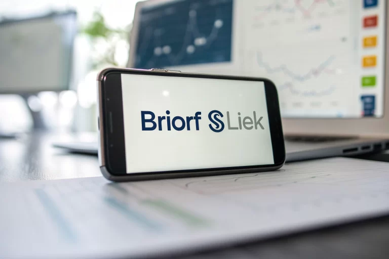 A smartphone displaying a prominent branded short link, set against a blurred backdrop of a digital marketing office, with soft lighting enhancing the clarity and professionalism of the image.